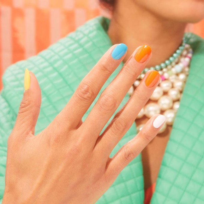 optimistic orange skittle mani