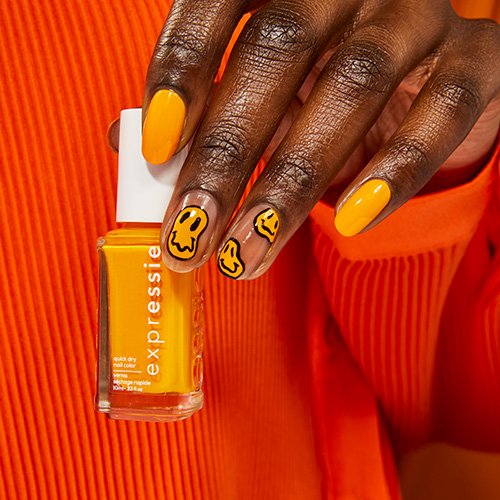 melting smiley face nail art