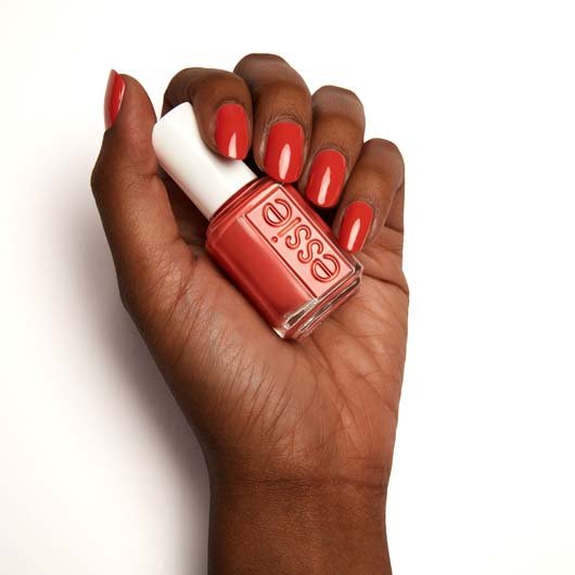 yes, I canyon burnt orange nail polish with yellow and red tones essie
