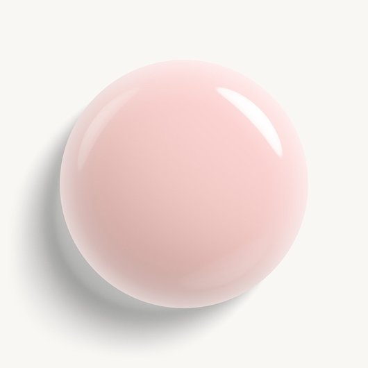 Glossy, high-shine drop of essie 'skinny dip' nail polish against a clean white background.