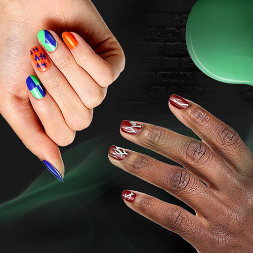 two hands showcasing essie halloween nail art designs against a spooky green and black background