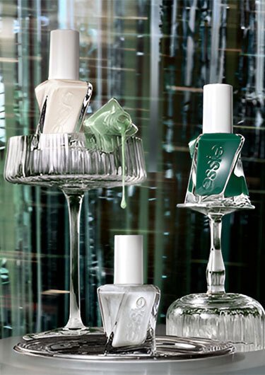 A colorful assortment of essie nail polish bottles arranged together
