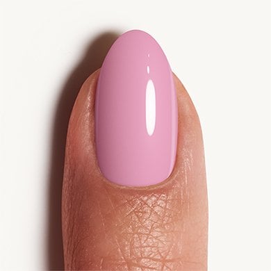 Light skin fingertip showing nail painted in lavender purple Lilacism polish by essie