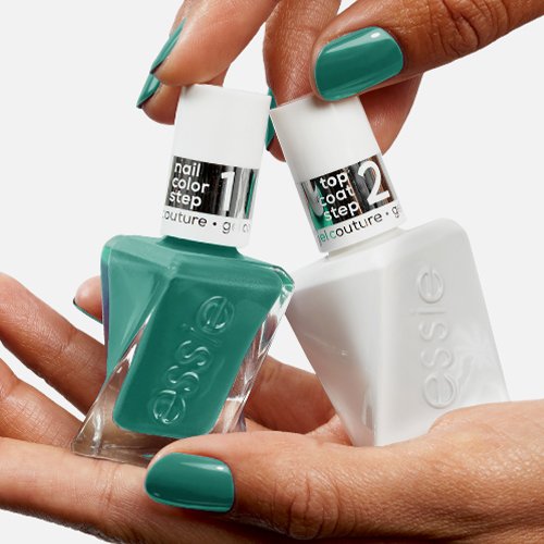 light skin hands holding two bottles: green gel by essie nail polish and white gel top coat.