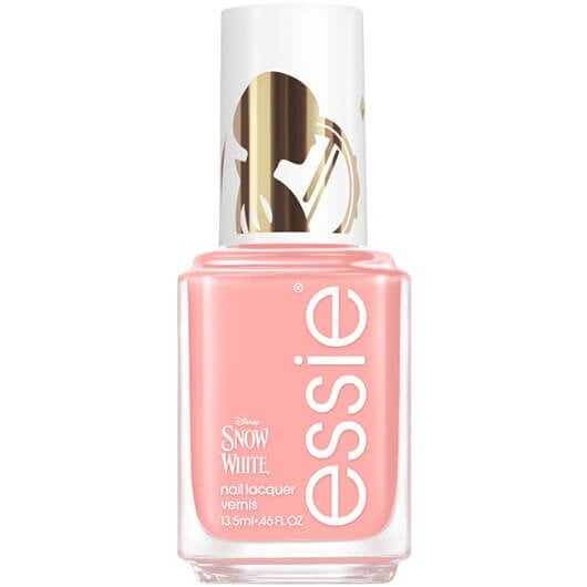 White background with a bottle of no prince needed essie nail polish in a creamy dusty pink shade