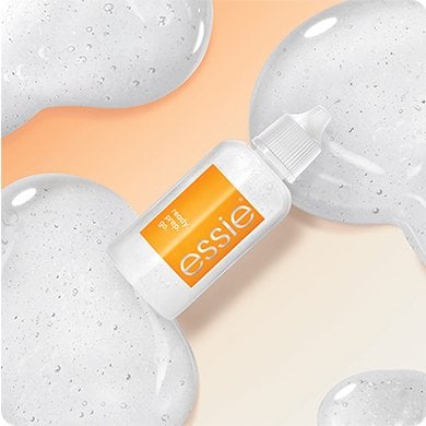 Bottle of ready prep go cuticle remove over white droplets and a pale orange background