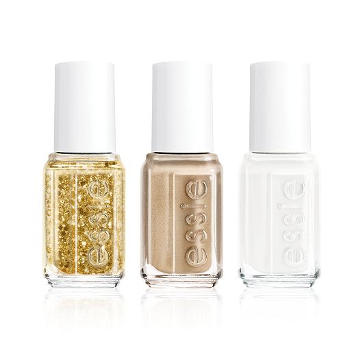 bottles of essie nail polish in the shades summit of style, good as gold, and blanc against a white background